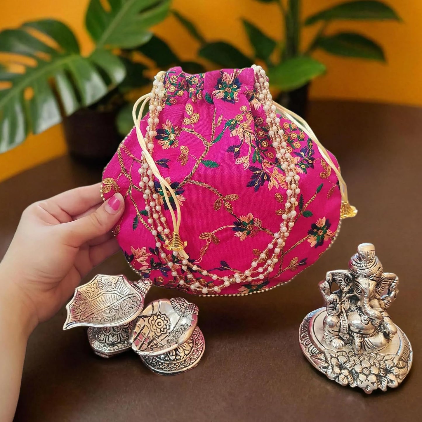 Bhumatha Gift Bag for Anniversary, Wedding, Housewarming, Diwali & Corporate - Silver Plated Pagdi Ganesh Idol Statue with Beautiful Designer potli Bag and 2 dhiyas (10H x 8W x 10L CM)… (pink)