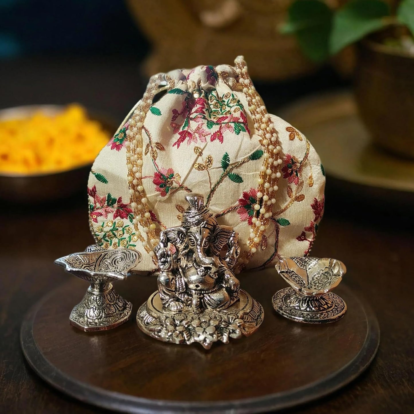 Bhumatha Gift Bag for Anniversary, Wedding, Housewarming, Diwali & Corporate - Silver Plated Pagdi Ganesh Idol Statue with Beautiful Designer potli Bag and 2 dhiyas (10H x 8W x 10L CM)… (Beige)